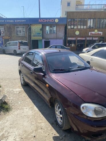 мерседес 124 2 3: Автомобиль Daewoo Lanos в кузове седан, выполненный в темно-бордовом — 6