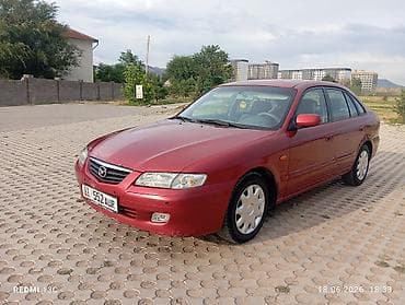 down pipe: Mazda 626: 2000 г., 2 л, Механика, Бензин, Хэтчбэк — 9