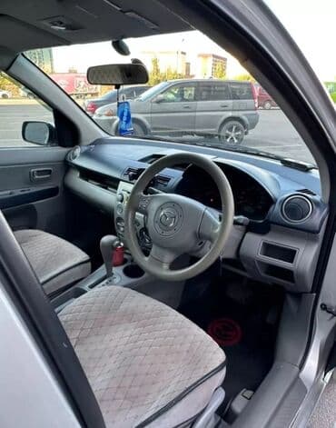 срочно в связи с переездом: Mazda Demio: 2003 г., 1.3 л, Автомат, Бензиновая, Седан — 5