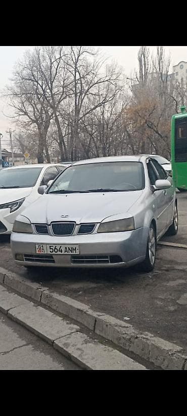 honda cvik: Daewoo Gentra: 2002 г., Бензин, Седан — 4