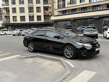 byd e7: Toyota Camry: 2015 г., 2.5 л, Автомат, Гибрид, Седан — 2
