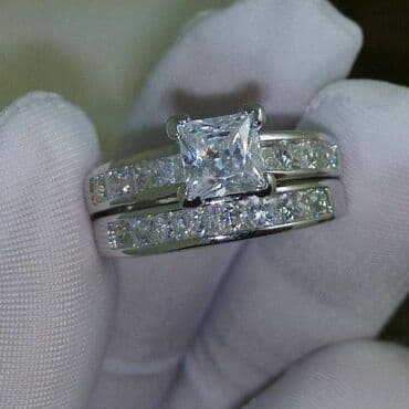 свадебные наборы ручной: Эффектный комплект из двух серебристых колец. Центральное кольцо — 4