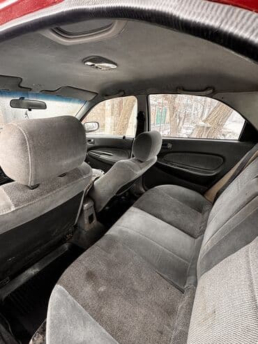 mx 5: Mazda 323: 1996 г., 1.8 л, Автомат, Бензин, Седан — 7
