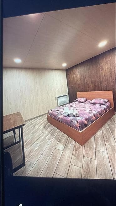 Комната-студия для краткосрочного проживания - Уютная спальня с