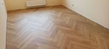 Мы — команда опытных мастеров по укладке напольных покрытий: ламинат