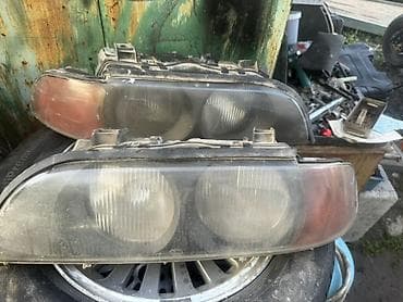 атего 1223: Комплект передних фар BMW — 3