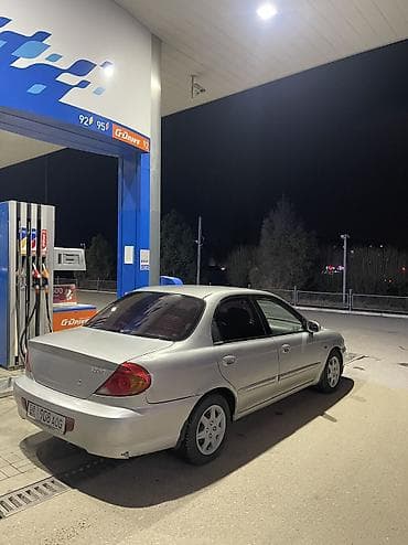 e53 4 8: Kia Shuma: 2002 г. — 4