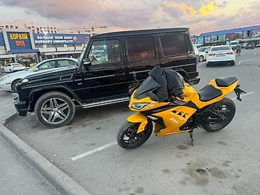 suzuki shift: Спортивный мотоцикл в ярком желто‑черном исполнении. Особенности: - — 2