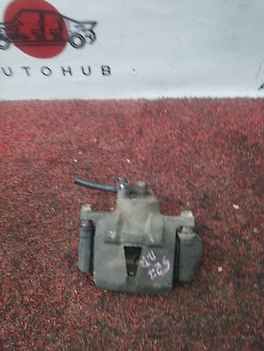 Суппорт тормозной передний правый для TOYOTA Vitz (Yaris) SCP10, 1.0