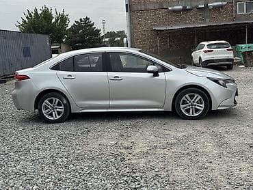 Toyota Corolla: 2022 г., 1.8 л, Вариатор, Гибрид, Седан — 4