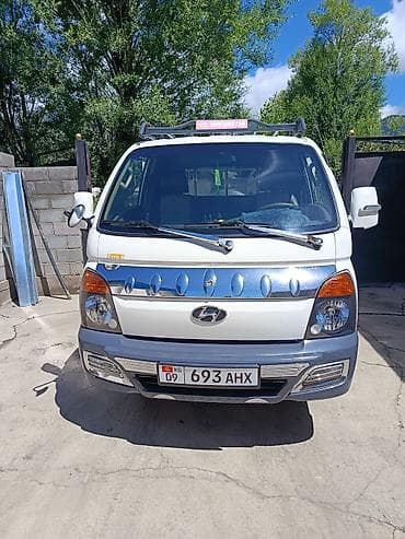 авто компании: Hyundai Porter II бортовой грузовик - Компоновка: однорядная кабина — 7