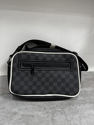 Сумкалар: Сумка через плечо, компактная и функциональная. Описание: - Материал — 2