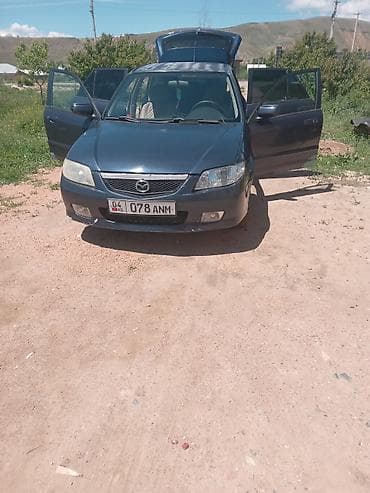 на мазда 323f: Mazda 323: 2001 г., Хэтчбэк — 4