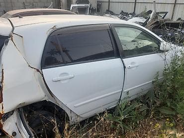 япония машина: Toyota Corolla: 2003 г. — 4
