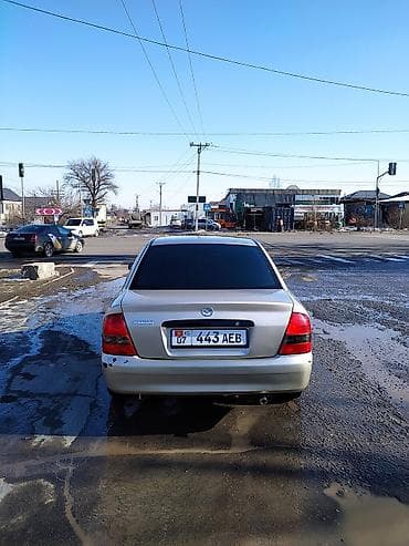 mazda 2: Mazda 323: 2000 г., 1.5 л, Механика, Бензин, Седан — 6