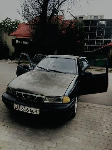 Daewoo Nexia: 2005 г., Кол менен иштөөчү, Бензин, Седан — 2