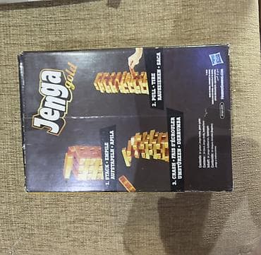 золотой ворон: Jenga Gold — настольная игра Hasbro с «золотыми» брусками. Цена - 350 — 5