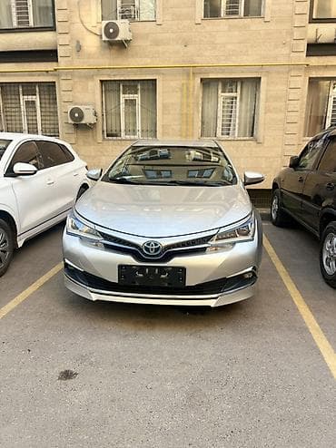 Toyota Corolla: 2019 г., 1.8 л, Вариатор, Электромобиль, Седан