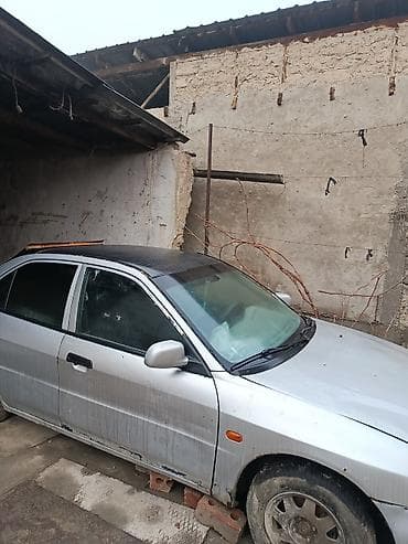 matiz diska: Mitsubishi Carisma: 1994 г., 0.1 л, Механика, Бензин, Седан — 2