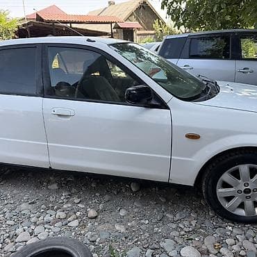 домашний вентилятор: Mazda Familia: 2001 г., Седан — 6