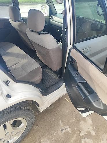 Mitsubishi Pajero iO: 2003 г., 2 л, Автомат, Бензин, Внедорожник — 6