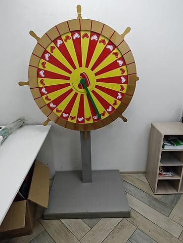 бизнес: Игровое колесо фортуны на стойке. Высота 180 см, диаметр колеса 100 — 4
