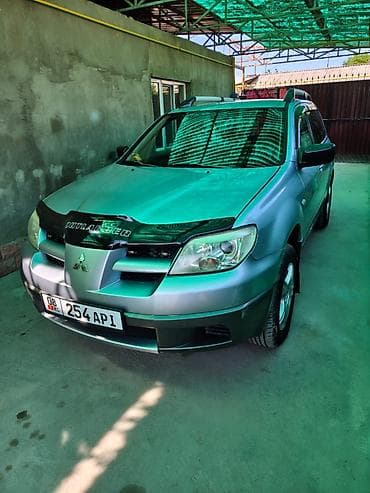 lancer evolution: Mitsubishi Outlander: 2003 г., 2 л, Механика, Бензин, Кроссовер — 2