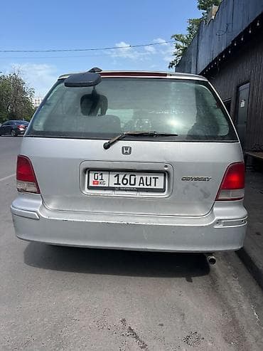 одисеи: Honda Odyssey: 1999 г., Минивэн — 2