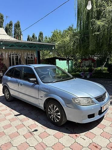 атего 1229: Mazda Familia: 1998 г., 1.8 л, Автомат, Бензин, Универсал — 1