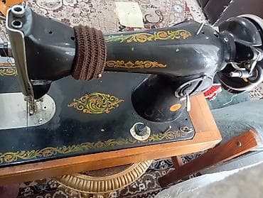 Ручная швейная машина в чемодане. Особенности: - Классическая