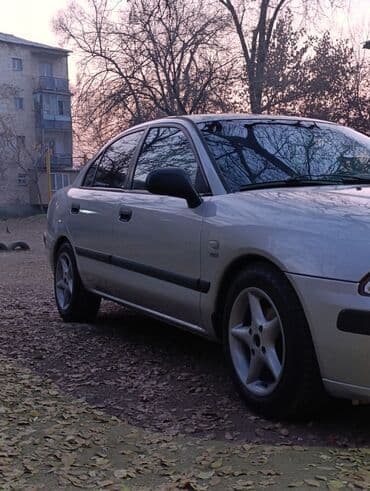 обмен дом на авто: Mitsubishi Carisma: 2000 г., 1.8 л, Механика, Бензиновая, Хэтчбэк — 4