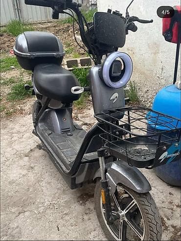 Электрический скутер Drongo - Компактный городской электроскутер с