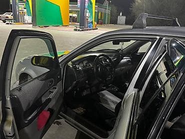 step rf3: Mazda 323: 2003 г., 1.6 л, Ручные, Бензин, Универсал — 8