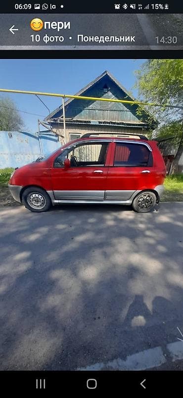 кадамжай авто: Компактный городской хэтчбек красного цвета с серебристым обвесом — 4