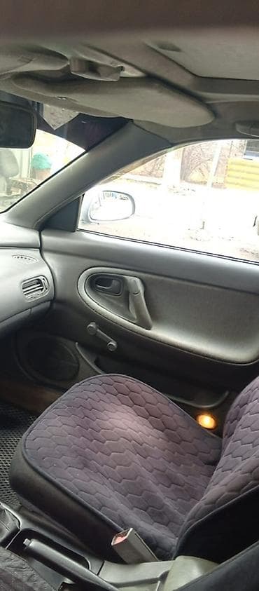 Mazda Cronos: 1993 г., 1.8 л, Механика, Бензин, Седан