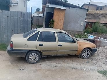 передний бампер нексия: Daewoo Nexia: 2007 г., Седан — 4