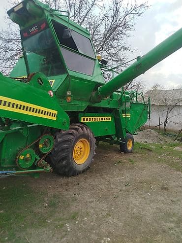 mazda kapella: Зерноуборочный комбайн (самоходный) Описание: - Классическая схема с — 7