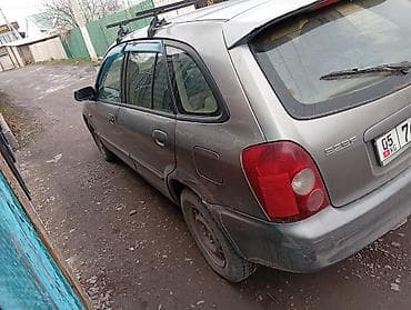 Mazda 323: 2002 г., Универсал
