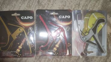 купить гитару в бишкеке бу: Каподастр есть в наличии: металлические и пластиковые . есть доставка — 6