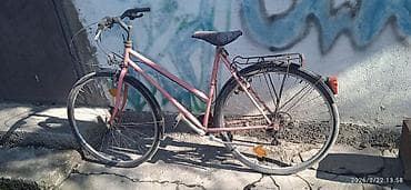 Книги и журналы: Городской велосипед с пониженной рамой на колесах 700*35с 18 скоростей — 1