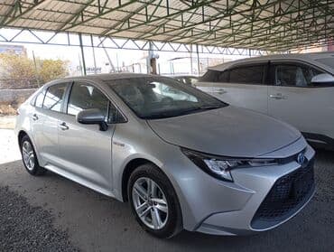 Toyota Corolla: 2020 г., 1.8 л, Автомат, Гибрид, Седан