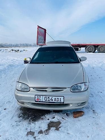 Kia Sephia: 1999 г., 1.6 л, Механика, Седан