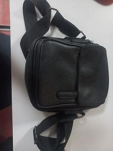 Цена договорная,Мужская кожнная из росси сумка через плечо, компактная