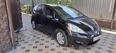 Honda Fit: 2009 г., 1.5 л, Автомат, Хэтчбэк — 2