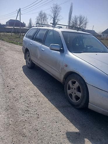 changan eado: Nissan Primera: 2002 г., 2 л, Механика, Бензин, Универсал — 1