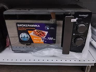35: Микроволновая печь Техномир - Объем: 20 л - Максимальная мощность — 1