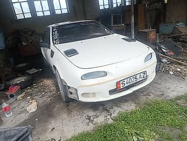 японский генератор: Nissan 100 NX: 1991 г., 1.6 л, Механика, Бензин, Купе — 5