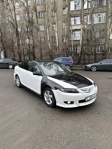 выхлопная трасса: Mazda Atenza: 2003 г., 2.3 л, Типтроник, Бензин, Лифтбек — 1