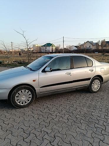 bmw e34 1995: Седан серебристого цвета, 4 двери, передний привод. Кузов с плавными — 2