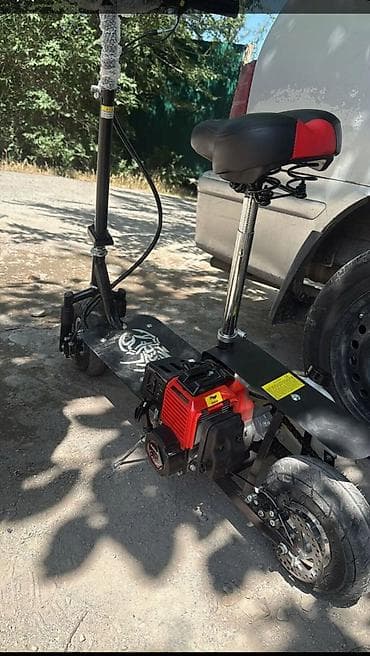 мотор мопеда: Бензиновый самокат с сиденьем - Двигатель: одноцилиндровый — 1